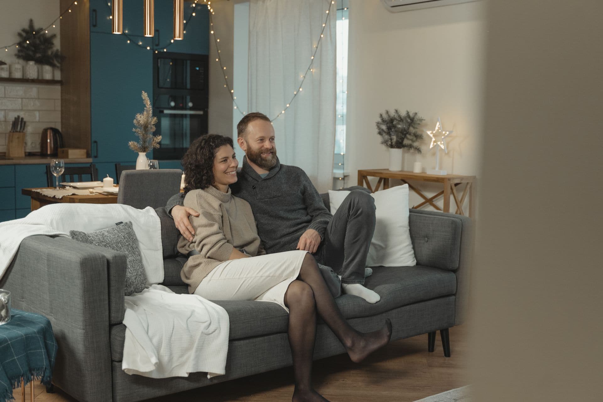 A couple relaxed and warm at home of an evening